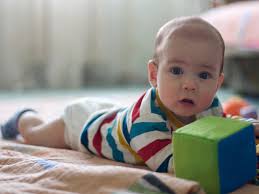 Best first birthday gift for a photo shoot. How To Do Tummy Time With Your Baby 8 Fun Activities To Try