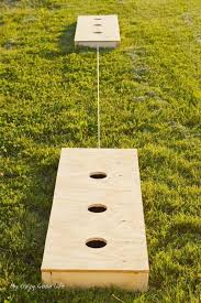 Washer toss, also known as washer pitching, washers, huachas, or washoes is a fun and engaging lawn game that is on the rise right now. Diy Outdoor Game Three Hole Washers Game My Crazy Good Life