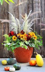 Artificial plants that get a significant amount of direct sunlight exposure need protection from a product with extra uv coating. Diy Fall Thanksgiving Decorations Planter So Easy A Piece Of Rainbow