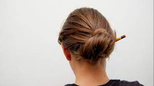 And yes, this policy applies to buns, too. How To Make A Bun Without A Hair Tie Hair Hair Ties Hair Ties Tutorial