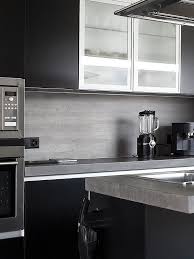 The white of the cabinets, chairs and table combined with the wooden cabinets and accents are very. Modern Light Gray Subway Backsplash Tile Contemporary Design Modern Kitchen Backsplash Grey Countertops Modern White Kitchen Cabinets