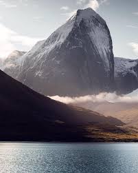 Just The Amazing And Untouched Landscape Of Greenland This Mountain Face Is More Than 1500 Vertical Meters High Landscape Scenery Incredible Places