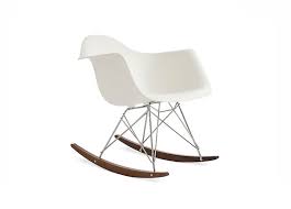 The multifunctional chair whose shell can be joined with a variety of different bases to serve diverse purposes. Herman Miller Eames Molded Plastic Armchair Rocker Base Est Living