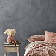Bedroom With A Suede Textured Gray Wall Feature Wall Bedroom Painted Feature Wall Gray Painted Walls