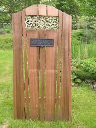 While practical, a gate can be designed as a welcoming structure hinting at a beautiful garden awaiting. Cedar Garden Gate Thuja Wood Art Reclaimed Cedar Furniture Wood Art Vancouver Victoria Gulf Islands British Columbia