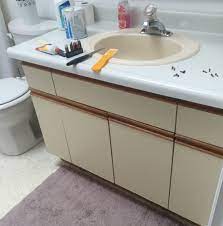 If you need help creating the best countertop for bathroom vanities, consider creating your own custom bathroom vanity top. Bathroom Update How To Paint Laminate Cabinets The Penny Drawer