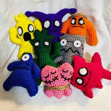 (from left to right) the red herring . I Finished Another Set Of Trivia Murder Party Dolls These Guys Are So Much Fun To Make Crochet