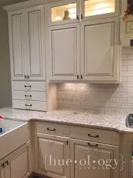 Painting The World One Hue At A Time White Distressed Cabinets Best Kitchen Cabinets Kitchen Cabinets