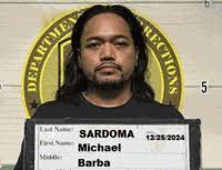 Man arrested after stolen firearm, drug paraphernalia found in couch