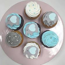 Elephant cake topper, elephant baby shower cake decoration, first birthday figurine centerpiece. 8 White And Blue Elephant Baby Shower Cupcakes Photo Elephant Baby Shower Cupcake Toppers Yellow Elephants Baby Shower Cupcake And Boy Baby Shower Elephant Cupcakes Snackncake