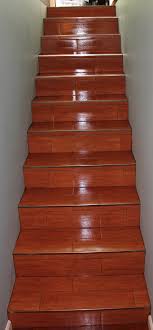 A photo gallery of amazing design ideas for staircases with tile floors. Tiled Stairs Shefalitayal