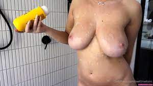 Provocative Stepmom Caressing Her Big Tits In The Shower Video at Porn Lib