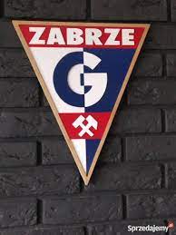 World with an enormous ball, tense muscles and fists. Herb Gornik Zabrze Sprzedajemy Pl