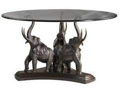 Despite their strength and durability, they are easy and light enough to move around. Elephant Dining Table Base But With Clear Glass Top Dining Table Round Pedestal Dining Table Man Cave Coffee Table