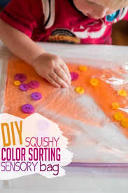 Making sensory pouches is a quick and inexpensive way to make an engaging and relaxing sensory activity for people living with dementia. Make A Super Easy Squishy Color Sorting Sensory Bag With Your Kids
