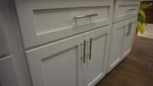 The doors attach to the frames with screws. White Cabinet Doors Open Up Your Kitchen Outside The Box