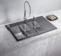 This exclusive design will let nobody indifferent as it really highlights the infinite smooth atmosphere of the kitchen. Stainless Steel Kitchen Sinks And Modern Faucets Functional Kitchen Design Ideas Kitchen Sink Design Modern Kitchen Sinks Modern Kitchen Sink Faucets