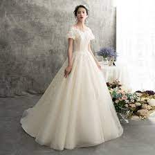 Chic Beautiful Champagne Wedding Dresses 2018 A Line Princess V Neck Puffy Short Sleeve Backless Appliques Since bridal dress adds to overall perfection, then brides need to ensure that it works with the body shape well rather than against it. chic beautiful champagne wedding dresses 2018 a line princess v neck puffy short sleeve backless appliques lace beading sweep train ruffle