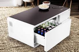 Charge your devices, play music with bluetooth, and entertain friends with snacks and drinks: Sobro Cooler Coffee Table
