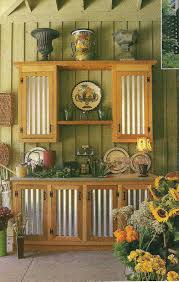 Outdoor Cabinet Using Cedar And Corrugated Tin Could Be Used For Many Purposes From South Outdoor Cabinet Rustic Outdoor Kitchens Outdoor Kitchen Cabinets