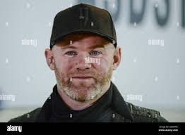 Wayne talks to hi-res stock photography and images