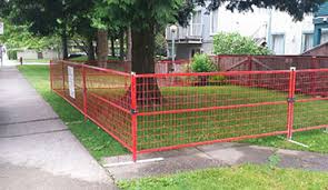 Yellow pvc coated crowd control barriers. Temporary Fencing Rental Services Bc Maple Leaf Disposal