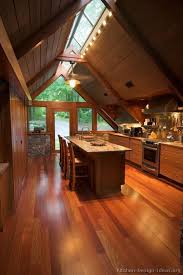 A Wood Cabin Kitchen With Vaulted Ceilings A Frame House Cabin Kitchens Rustic Kitchen Design