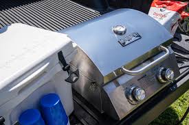 This portable powerhouse is constructed with a cast aluminum lid and body augmented with a glass. 13742 19 In Tabletop Grill Monument Grills