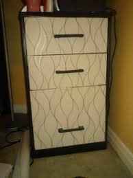 Steps for contact paper file cabinet redo. Snazzing Up The Filing Cabinet Via Hand