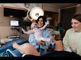 As the baby's head crowns, many women experience a burning sensation, but that's a sign that labor will soon be over. 10 Birth Videos That Offer An Uncensored Look At Delivering A Baby Fatherly