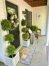 Whether you dream of a country style porch, a sophisticated contemporary style or you only have a small space for a charming portico, we welcome you here to design, plan, decorate, and landscape. Spring Porch Decorating Tips Spring Porch Decor Spring Porch Porch Decorating