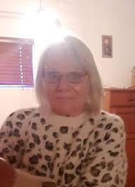 Hi I got a photo restored o this group the other day for my sister who  turns 80 this month would it be posable to clean this photo up mabe change  the