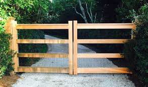 There are ways that gates can be hinged off vertical to enable the gates to lift over raised ground note: 25 Naturally Stunning Wooden Driveway Gate Design Ideas