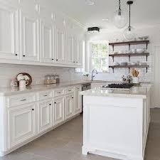 White Kitchen Cabinets With Cream Quartzite Countertops Farmhouse Kitchen Remodel Kitchen Remodel Small White Kitchen Remodeling