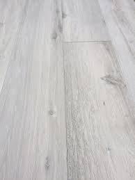 Grey Wood Effect Porcelain Tiles In Large Sizes Gutulia Planks Are Available In 1800x300 And 1200x30 Ceramic Floor Tile Tile Floor Wood Effect Porcelain Tiles