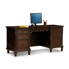 Choose from elaborate designs with plenty of drawers and storage space, or keep things simple with a more contemporary model. Ashland Credenza Desk American Signature Furniture
