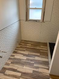 If you are adding hardwood to a different level (e.g. Ceramic Wood Floors In Bathroom Are In Same Direction Of Wood Floors Throughout The House Should They Be Running The Other Direction Homebuilding