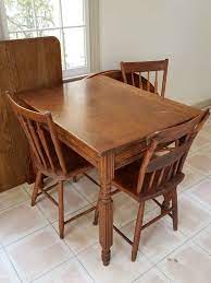 A solid and soulful piece of organic furniture that has been lovingly hand crafted using the finest reclaimed materials. Two Old Wood Tables Three Small Scale Wood Chairs Round Table Top Wood Dining Room Dining Room Table Wood Dining Room Table