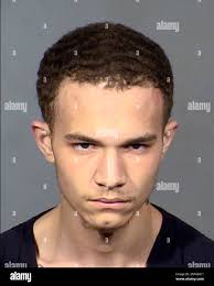 This undated photo provided by Las Vegas Metropolitan Police Department  shows Jordan Ruby, 18, following his arrest, Dec. 31, 2021. A Las Vegas  judge said Tuesday, Jan. 4, 2022 she'll decide next