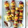 There are traditional foods cooked at bbqs such as hamburgers, hotdogs, ribs, pork shoulders, skewers. 3