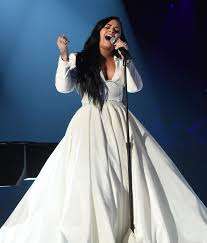 Attention any and all music lovers: Demi Lovato Returned To Grammys In Christian Siriano
