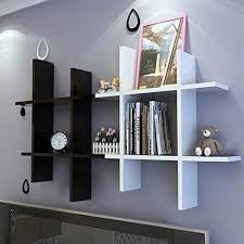 Kohl's has a wide variety of wall shelves to choose from, with many different styles available, including white floating shelves, black floating shelves, and trend lab floating shelves, so you can be sure you'll find the right option you need to fit your home's look. Wooden Wall Shelf Cross Display Wall Mounted Shelves For Wall Decor Home Goods Black Buy Online In Bahamas At Bahamas Desertcart Com Productid 44392664