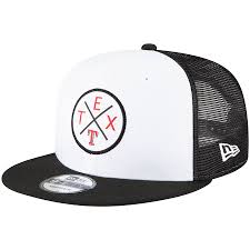 This logo also featured the outline of the state of texas in blue with a white and the slightly modified texas rangers' logo features a large white with blue trim cowboy hat on top of a white with it features a black capitol building behind a pitcher throwing to the plate. Men S Texas Rangers New Era White Black Vert 2 0 9fifty Trucker Snapback Hat