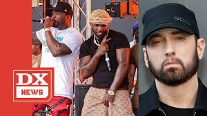 50 cent talks executive producing pop smoke's posthumous album, defends addition of karol g feature. 50 Cent Suggests Eminem Pop Smoke Collaboration Is Coming Youtube
