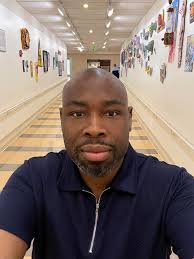 With my partner in the gospel laying to rest our brother Calvin Nicholson.