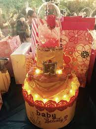 Beauty And The Beast Diaper Cake On Top Of A Hatbox Full Of Presents Bstarz Diaper Cake Cake Arts And Crafts