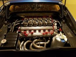 I am doing some preliminary research for an engine rebuild on my 1976 308 gtb. Ferrari 308 With A 400i V12 And Testarossa Heads Engine Swap Depot