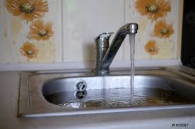 stainless steel sink plug hole close up
