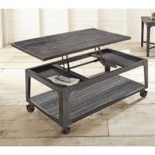 Was this review helpful to you? Bowery Hill Lift Top Coffee Table With Casters In Tobacco Buy Online In Bahamas At Bahamas Desertcart Com Productid 98772788