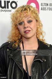 Amanda Lucille Warner celebrate Elton John's 70th Birthday and... News  Photo